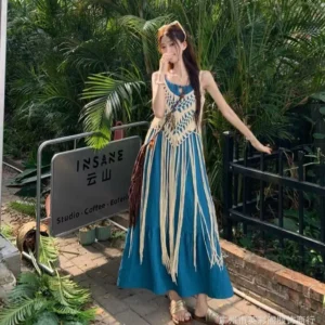 A unique and distinctive mid-length halter dress for women in spring with hollowed-out casual halter tops