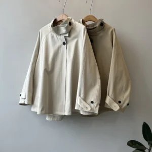 A new autumn collection of British off-the-beaten loose mid-length cape coats